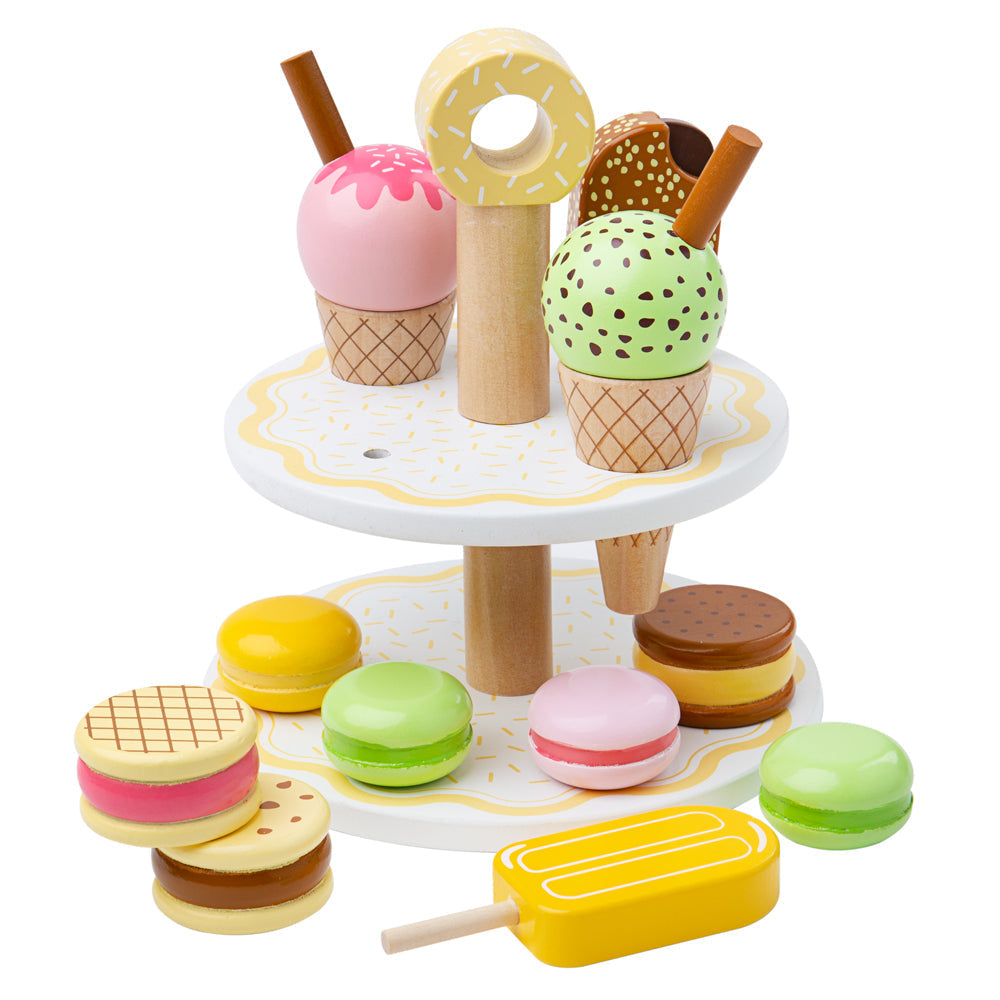 Front view of Sweet Treats Set wooden play food showcasing colorful desserts and a two-tier dessert stand on a white background