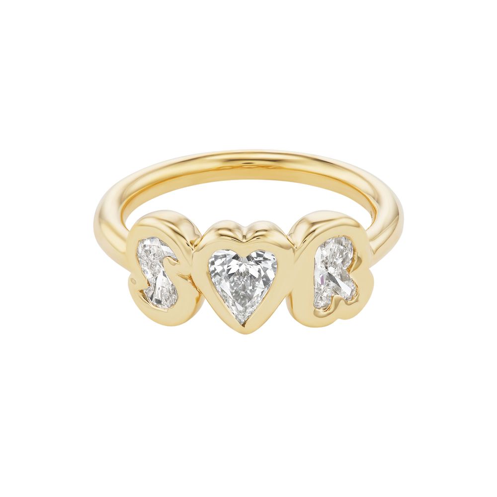 Front of Bubble Bezel True Love ring with heart-shaped center diamond and bezel-set initial diamonds, 18K yellow gold