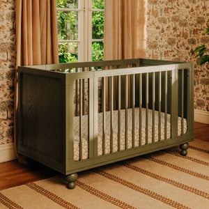 Three-quarter view of Astre All-Stages 8-in-1 Crib by Nate Berkus showcasing vertical slats in Archival