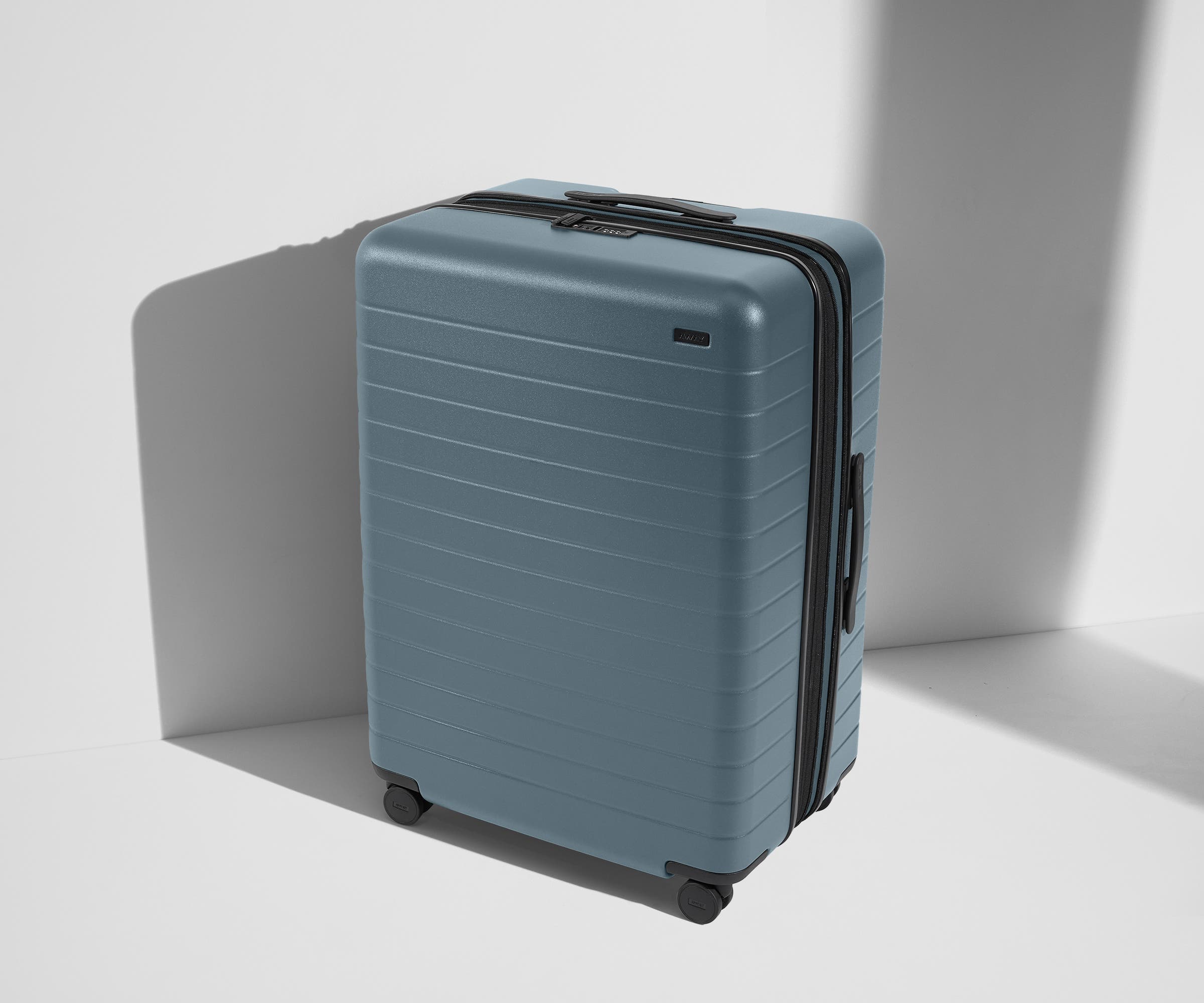 Away Large Flex Suitcase