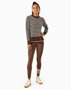 Model is wearing the Carlyle Crewneck in Chocolate/ Baby Blue Stripe with the Everyday Legging in Chocolate