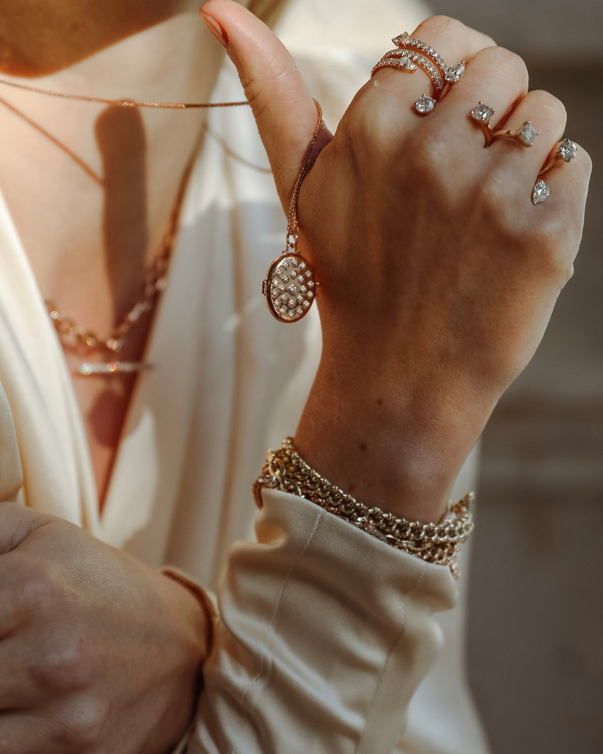 Etoile Locket shown in Rose Gold, 14k yellow gold