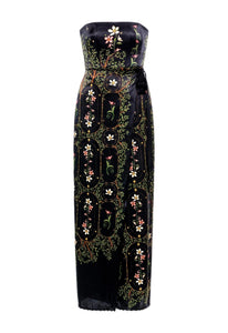 Front view of Cinefilia Noche Maxi Dress showcasing strapless empire-waist silhouette and floral print with white background