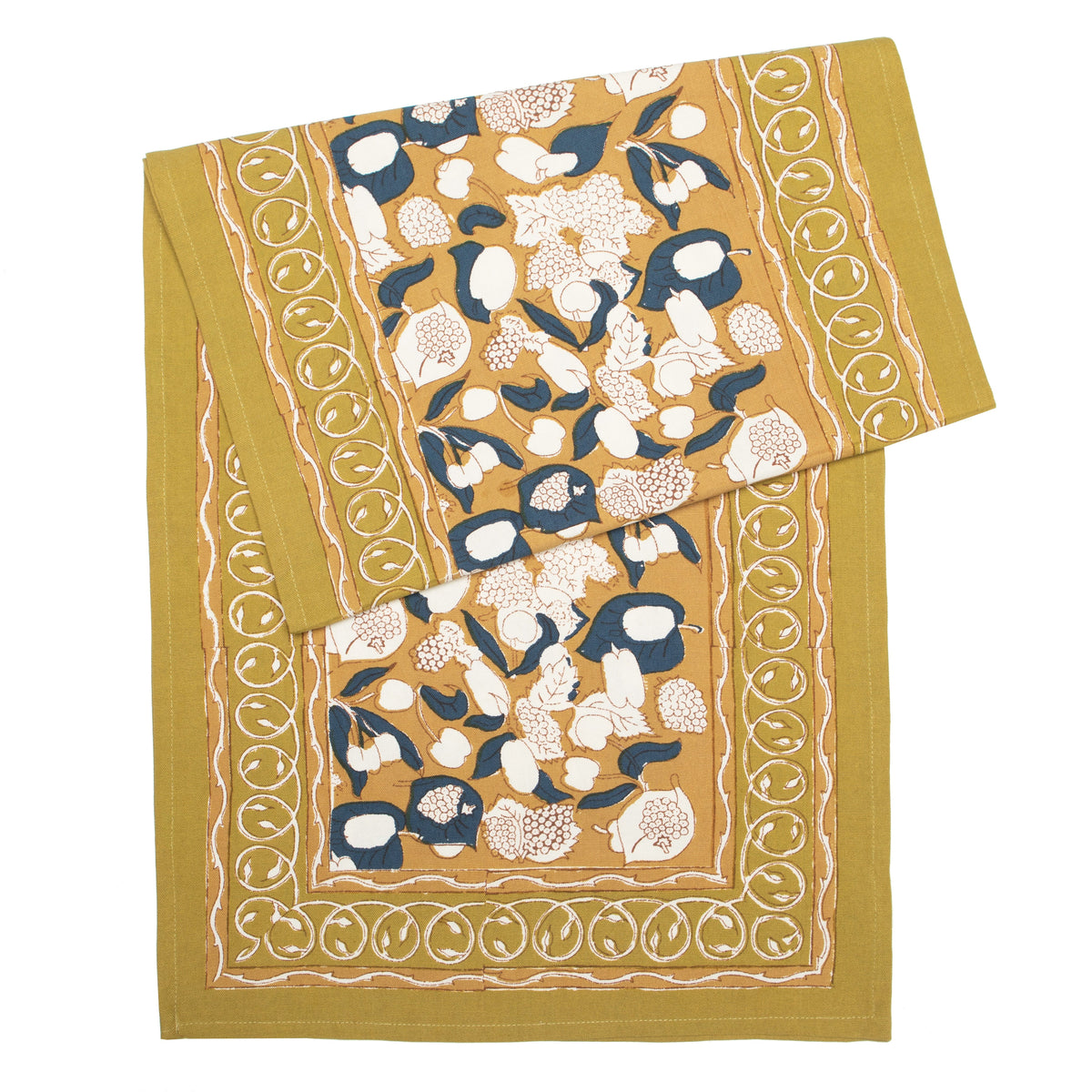 Close-up of Forest Harvest Runner Mustard and Blue showcasing its floral pattern and folded cotton fabric on a white background