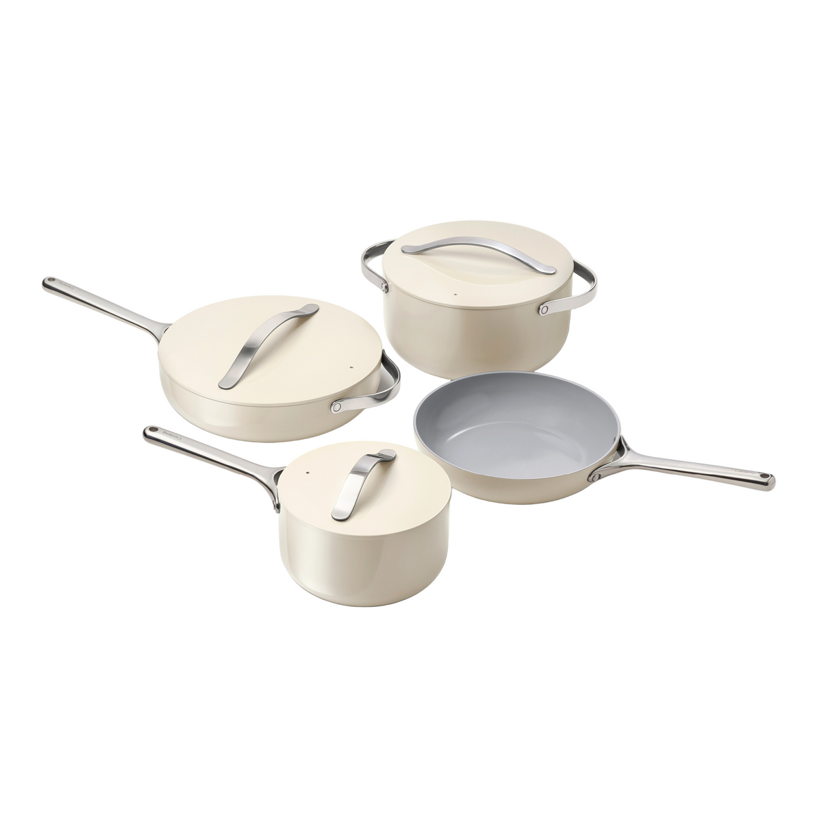 Angled view of 4-piece cream ceramic cookware set showing lids, gray nonstick interior, and stainless handles on white background