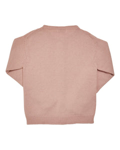 Pink sweater on a white background