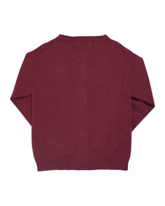 Maroon sweater on a white background