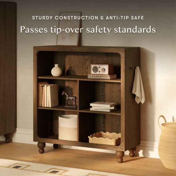 Front view of Astre Assembled Bookcase by Nate Berkus in Toffee showcasing anti-tip safety with styled shelves