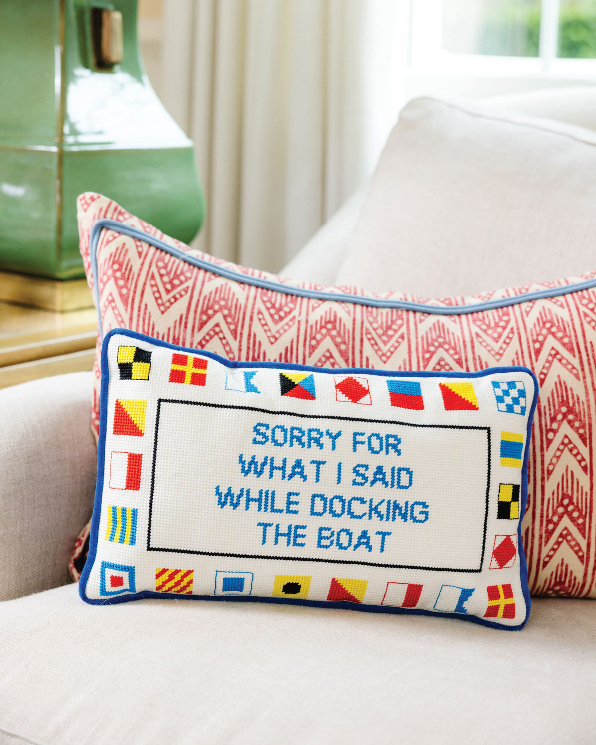 Docking The Boat Needlepoint Pillow - styled on sofa