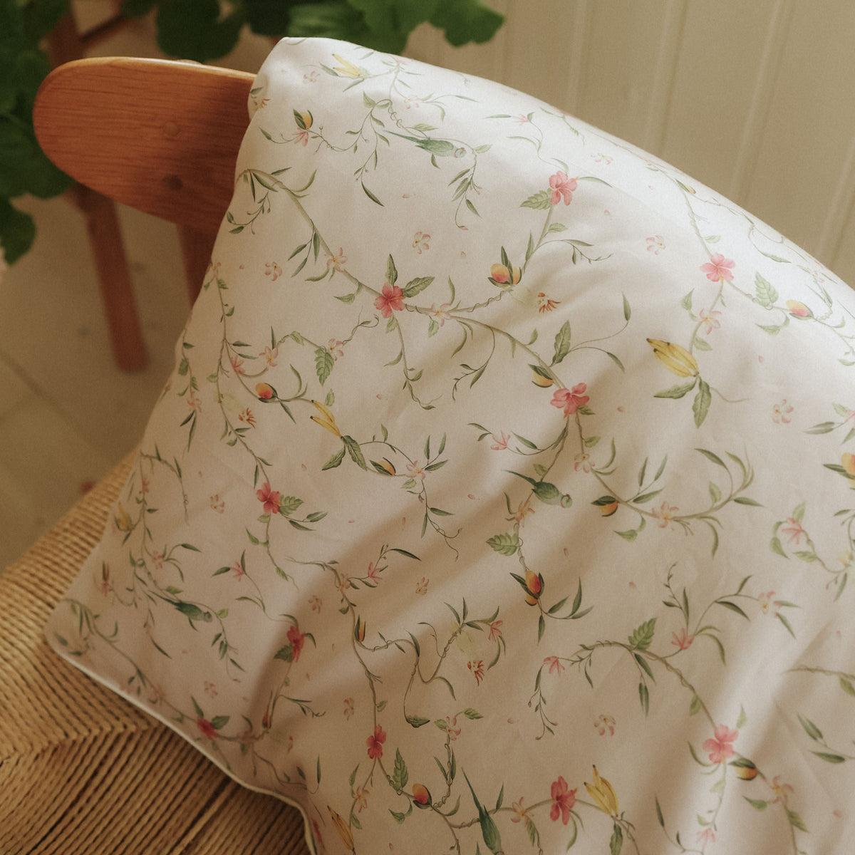 Dreaming of Paradise Baby Duvet hanging over a chair