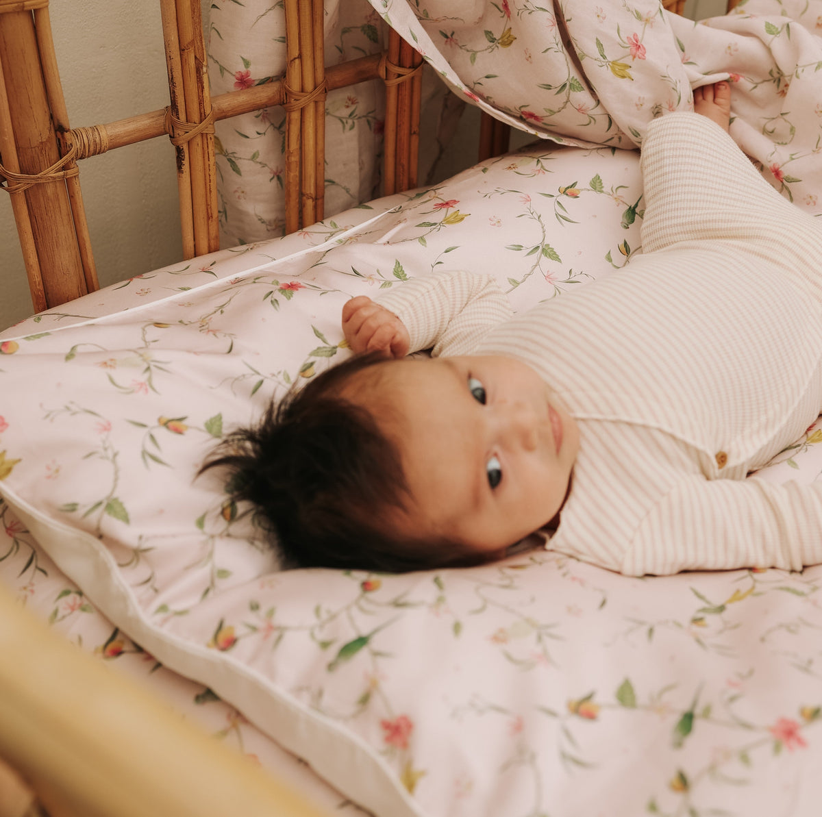 Dreaming of Paradise Baby Duvet with baby laying on top