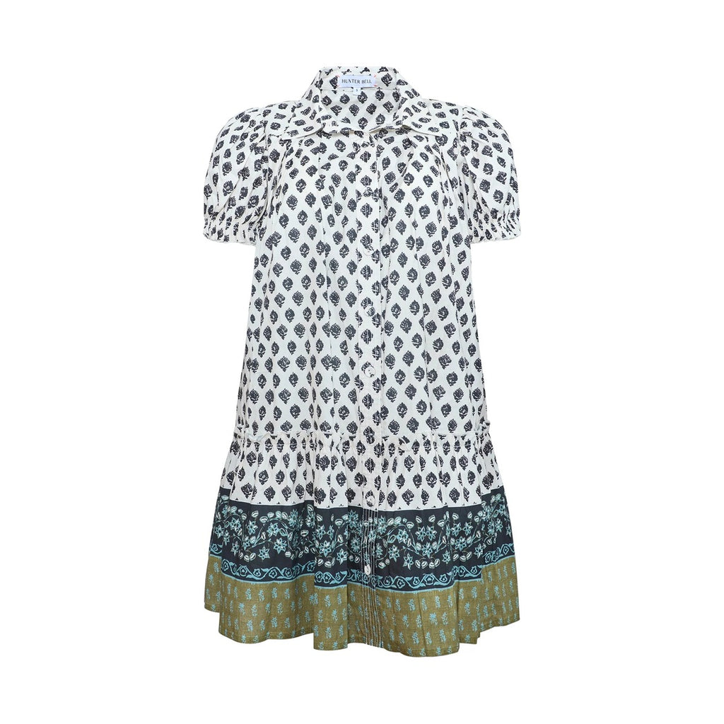 Front view of Drifter Mini Dress in Thistle & Vine Cream with collared neckline, button front, puff sleeves, and flounce hem