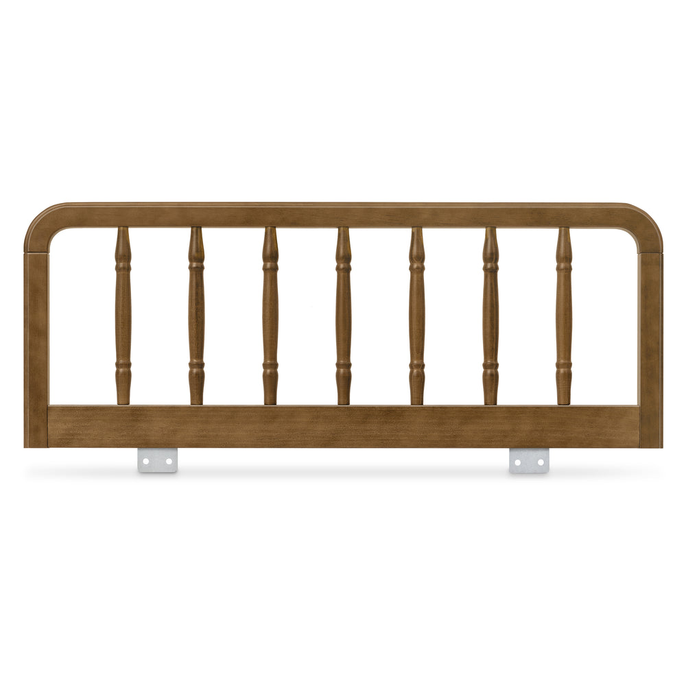 Front view of Liberty Spindle Twin/Full Bed Guardrail in Natural Walnut showcasing classic spindle design on a white background