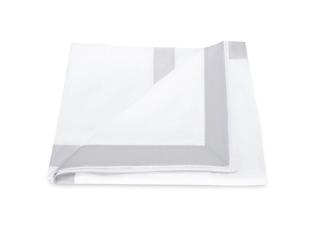 Front view of Emory Duvet Cover in Dove showcasing tailored gray border on a white background