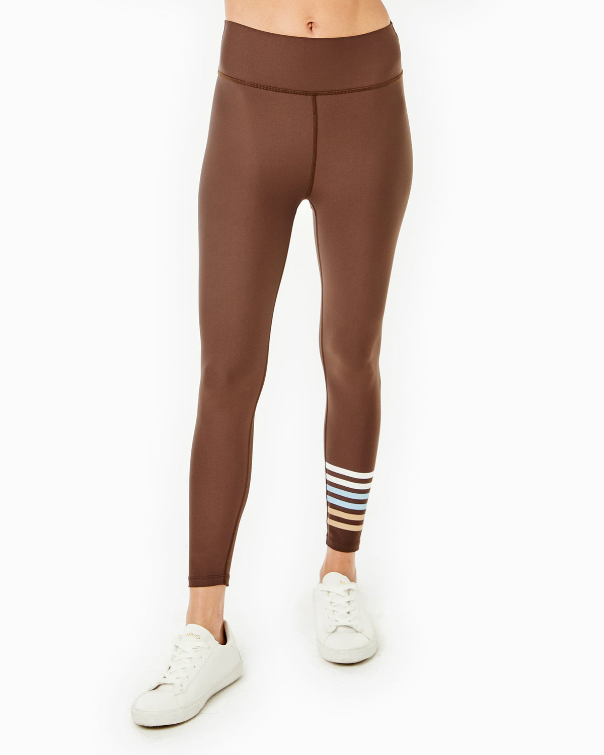 Front view of the Everyday Legging in Chocolate showing a high-rise waistband and multicolor stripe at the lower leg on a white background
