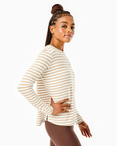 Model is wearing the Everyday Long Sleeve in Latte Stripe with the Everyday Legging in Chocolate