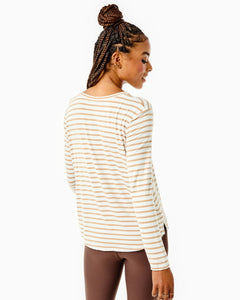 Model is wearing the Everyday Long Sleeve in Latte Stripe with the Everyday Legging in Chocolate