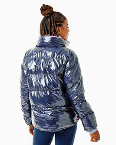 Model is wearing the Everyday Puffer Coat in Navy with the Everyday Pullover in Baby Blue and the Colleen Pants in Navy