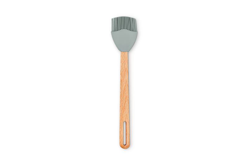 Full view of Signature Silicone Basting Brush with crown silicone bristles and beech wood handle on white background