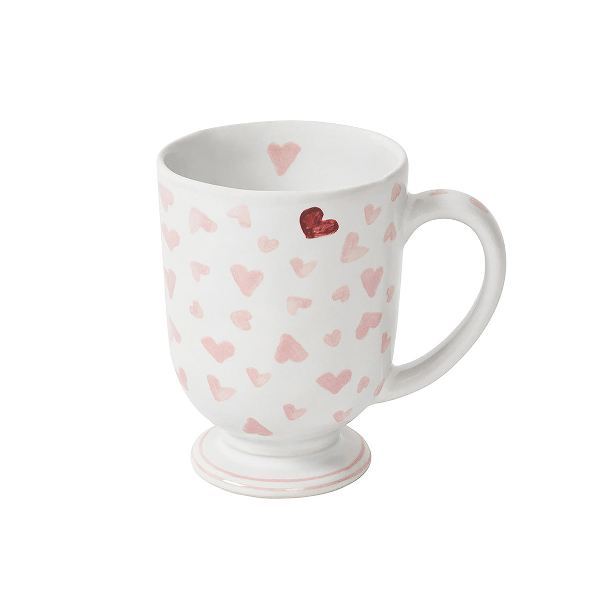 Three-quarter view of Love You More mug with pink heart pattern, red heart accent, and pedestal foot on white background