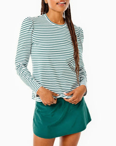 Model is Fairmount Long Sleeve in Super White/ Ivy Stripe with the Flounce Skort in Ivy