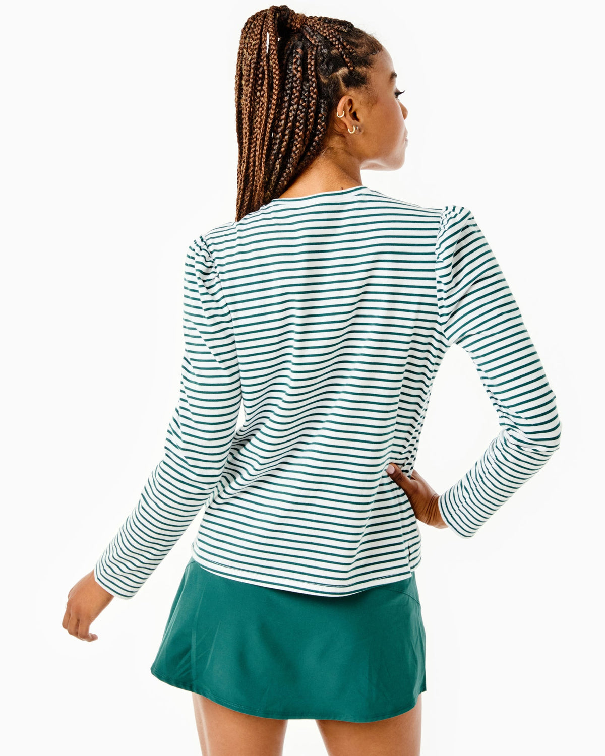 Model is Fairmount Long Sleeve in Super White/ Ivy Stripe with the Flounce Skort in Ivy