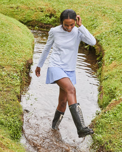 Model is wearing the Fairmount Long Sleeve in Super White / Violet Stripe and the Everyday Legging in Ivy