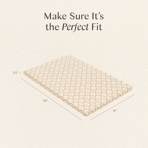 Angled view of All-Stages bassinet sheet showcasing a textured pattern with 35 by 28 by 18 inch dimensions