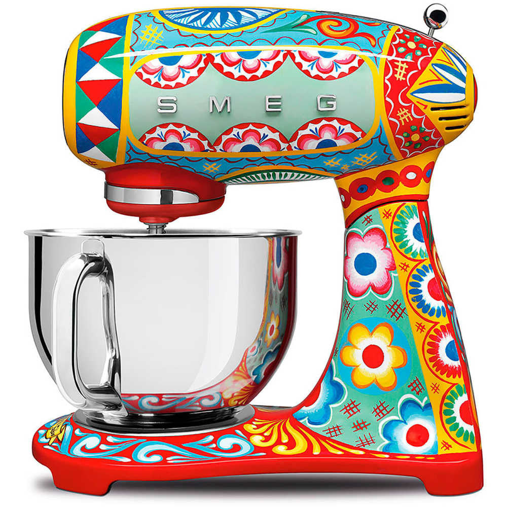 Side view of Dolce and Gabbana SMEG stand mixer with colorful Sicilian floral pattern and stainless steel bowl