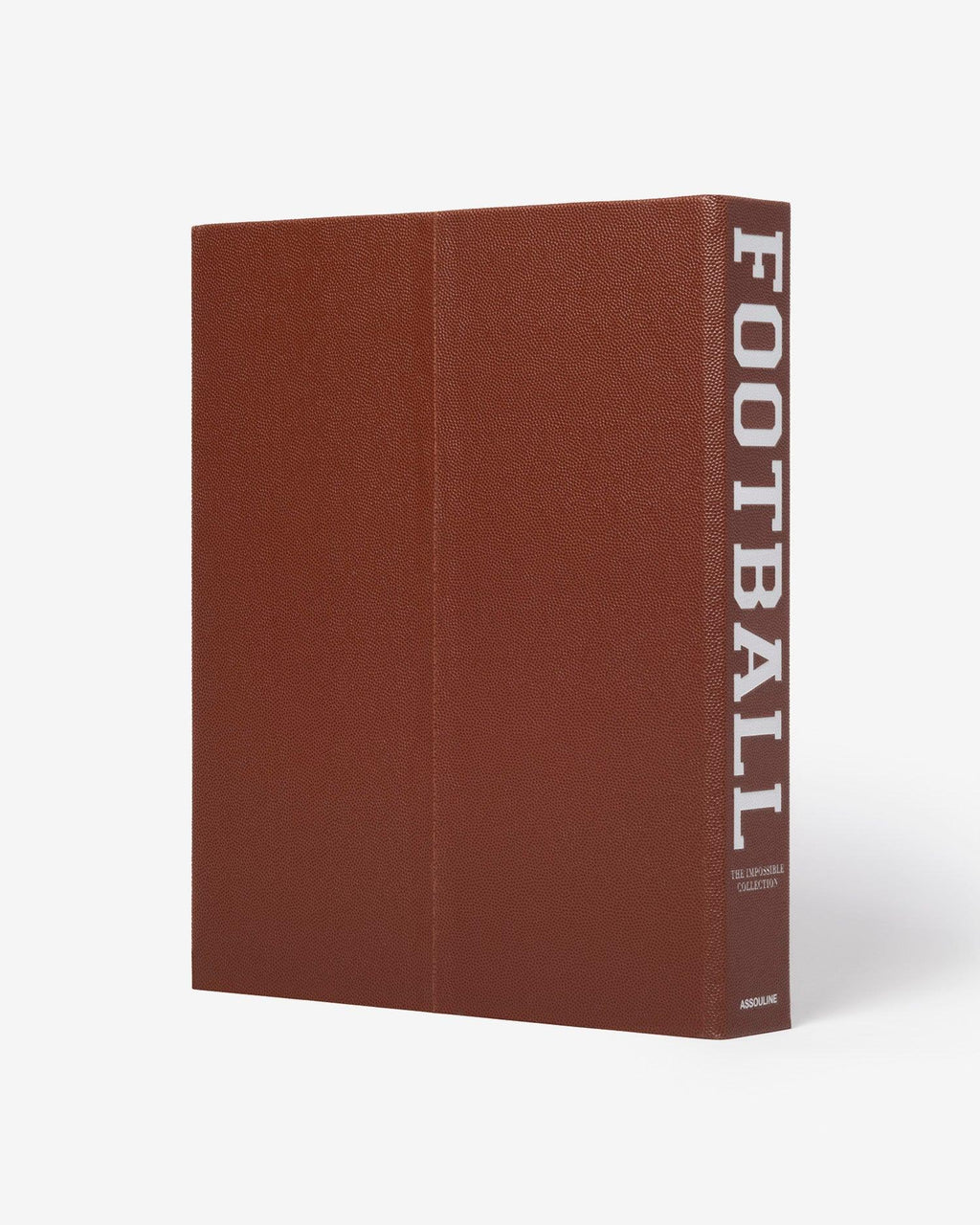 American Football: The Impossible Collection by Assouline: three-quarter view of the plain back face of the clamshell box; the rich dark brown pebbled leather surface is unadorned; FOOTBALL in large white block type on the spine, with THE IMPOSSIBLE COLLECTION and ASSOULINE in smaller white type below; white background
