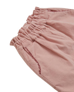 Close-up of a pink fabric with a white background