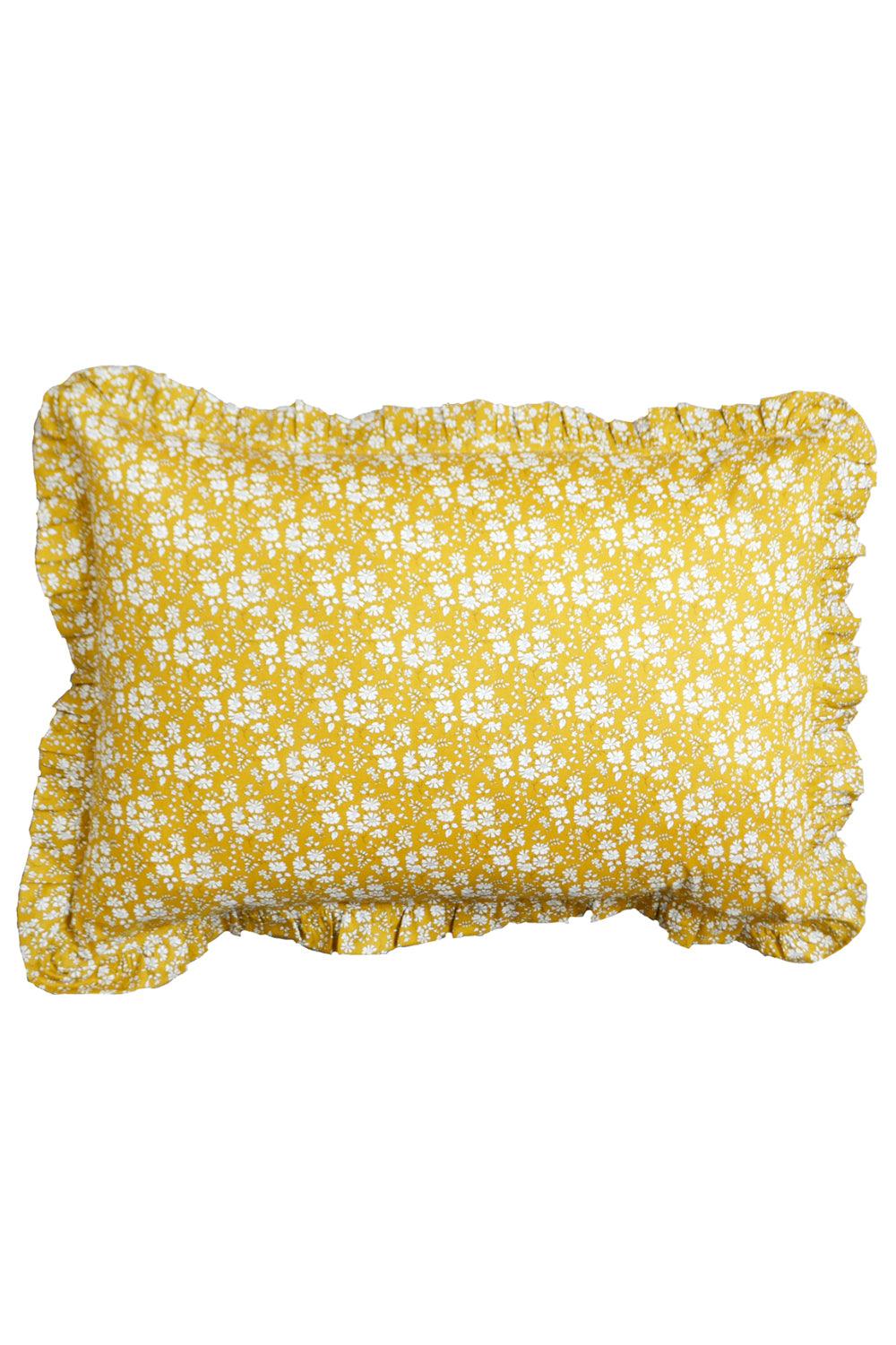 Front view of Capel Mustard Gathered Edge Pillowcase with white floral print and gathered ruffle edge on white background