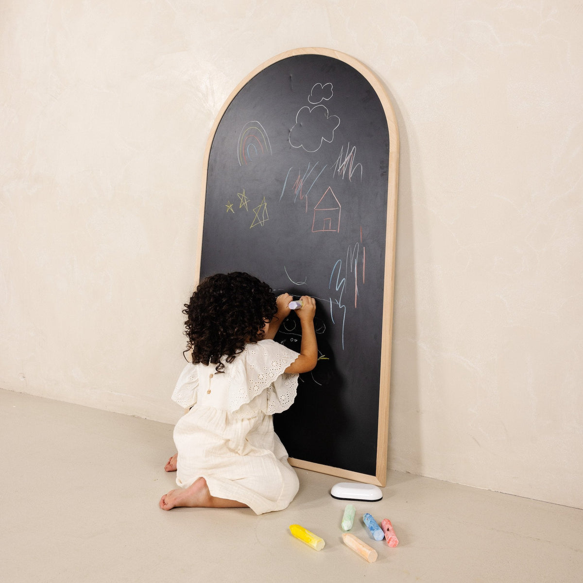 Beech@Kid drawing on the chalkboard side of the Chalkboard