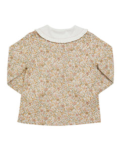 Floral blouse with a white collar on a white background