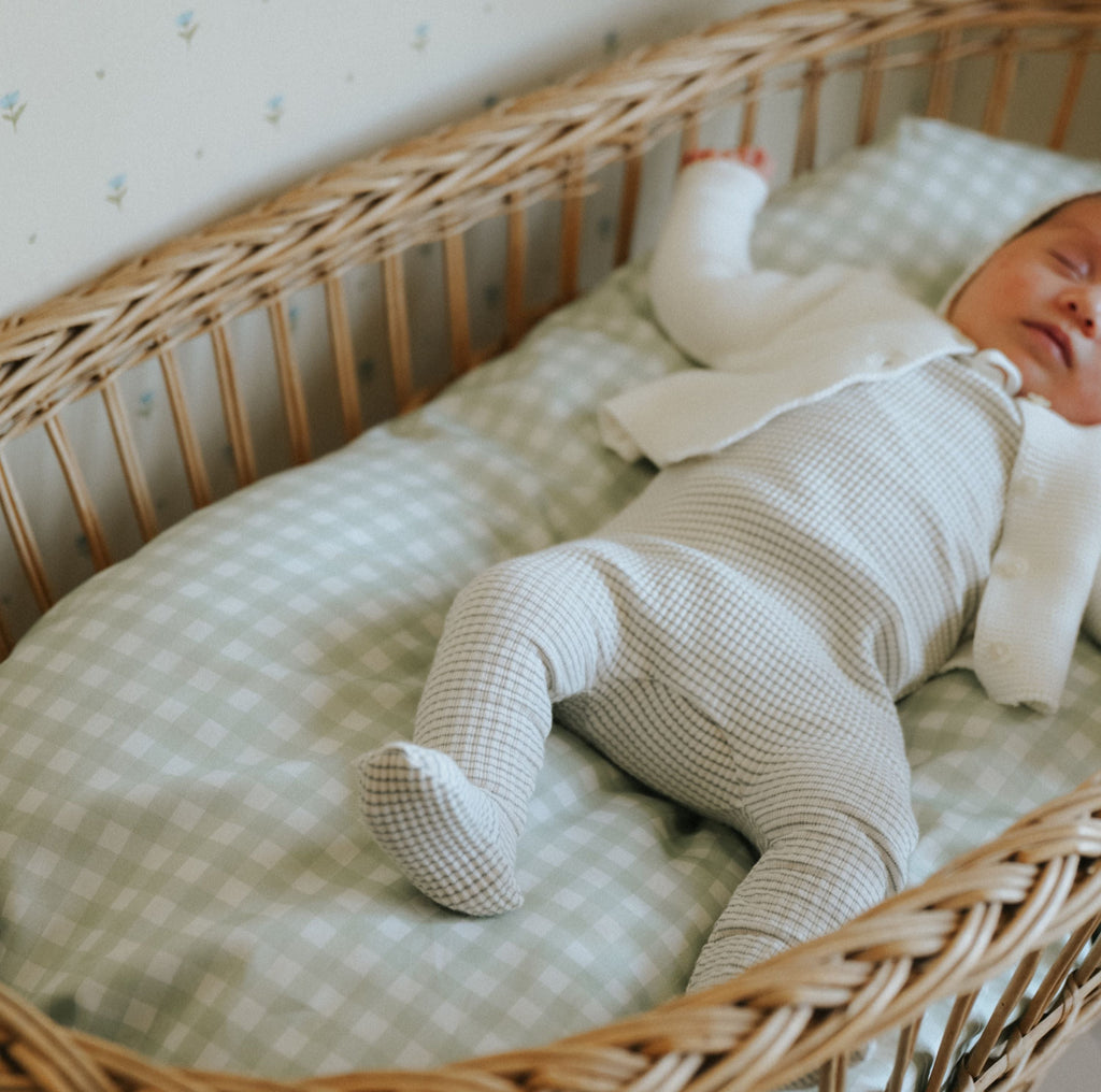 Picnic Gingham Green Crib Sheet with baby fast asleep