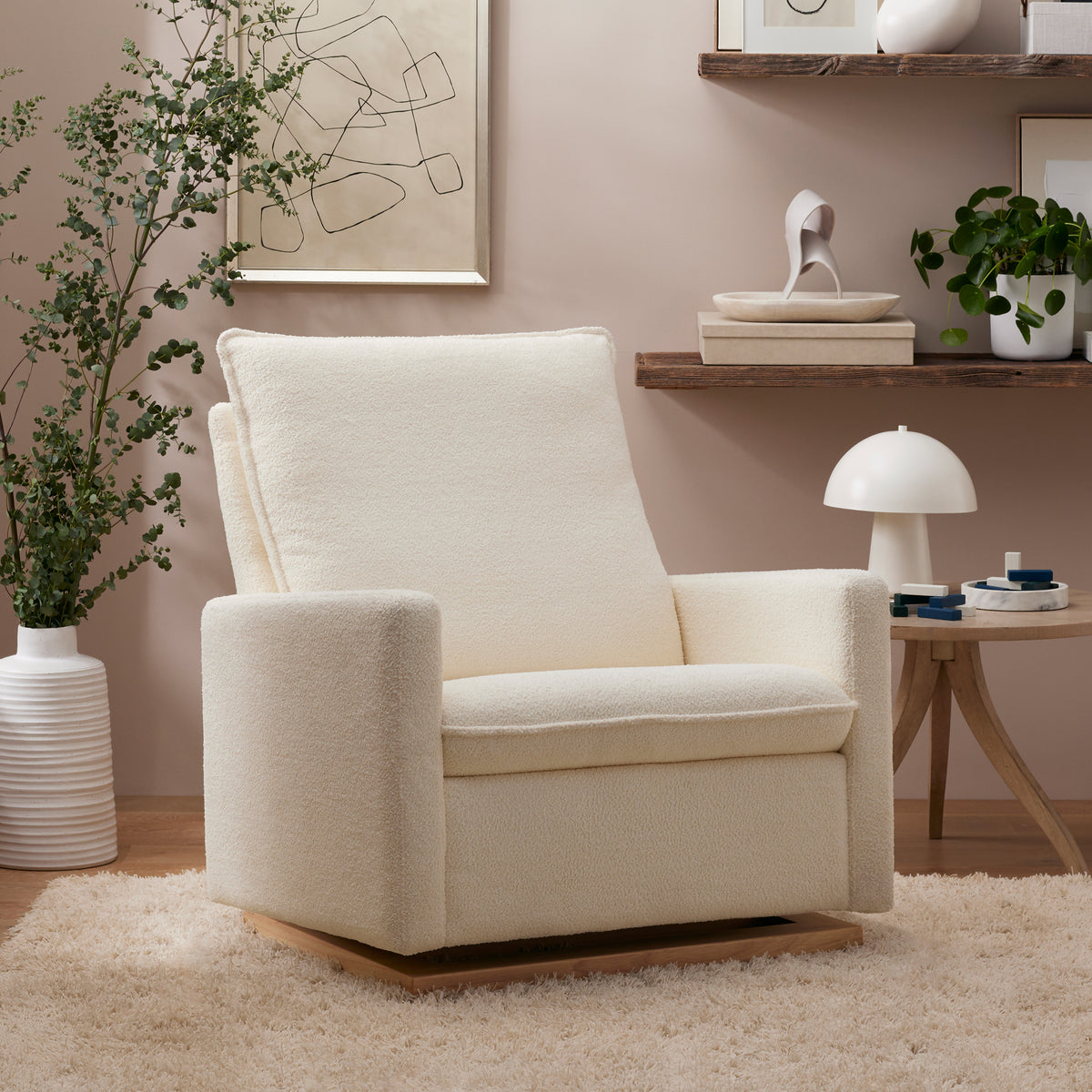 Front view of Cali Pillowback Chair and a Half Glider showcasing Chantilly fleece and light wood base in a living room