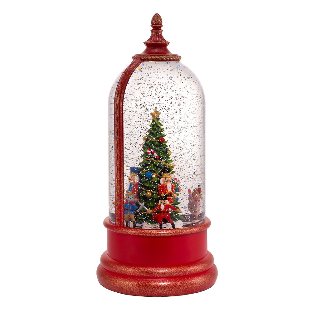 Front view of Musical Nutcracker Water Lantern showcasing red water-filled dome with Christmas tree and nutcrackers on white background