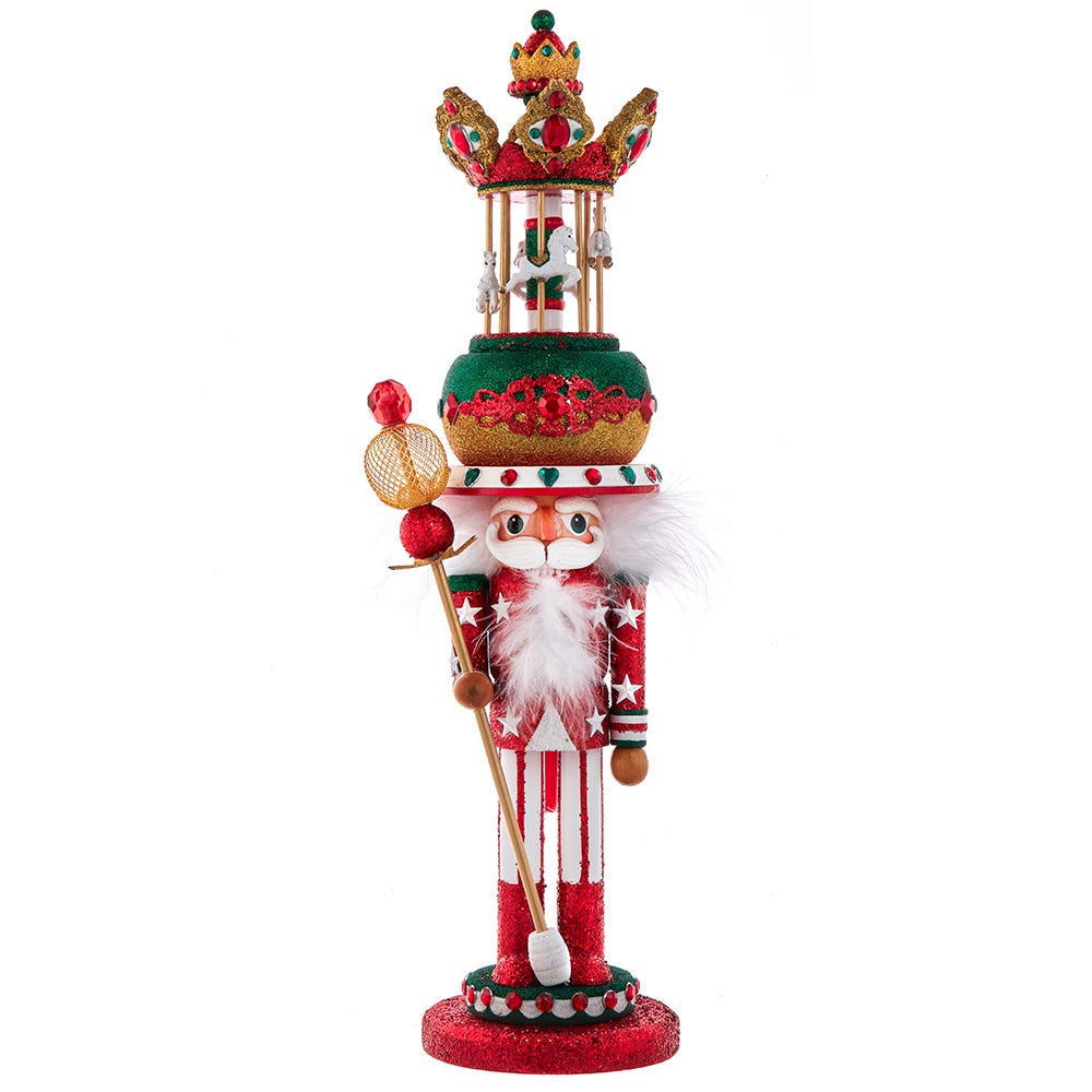 Front view of Carousel Hat Musical Nutcracker with glittered red and white suit and carousel hat on white background