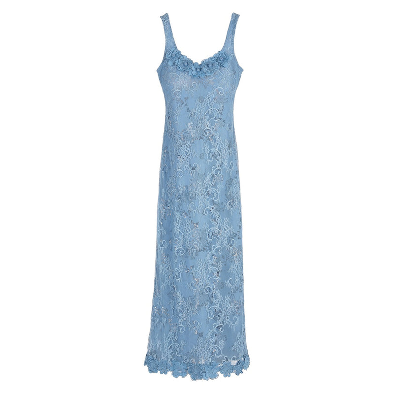 Front view of Hera Maxi Dress in Cornflower Blue showcasing layered floral lace and sheer unlined finish on white background