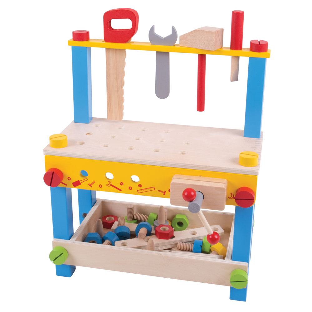 Front view of My First Workbench showcasing colorful wooden tools, pegboard and storage shelf with a white background
