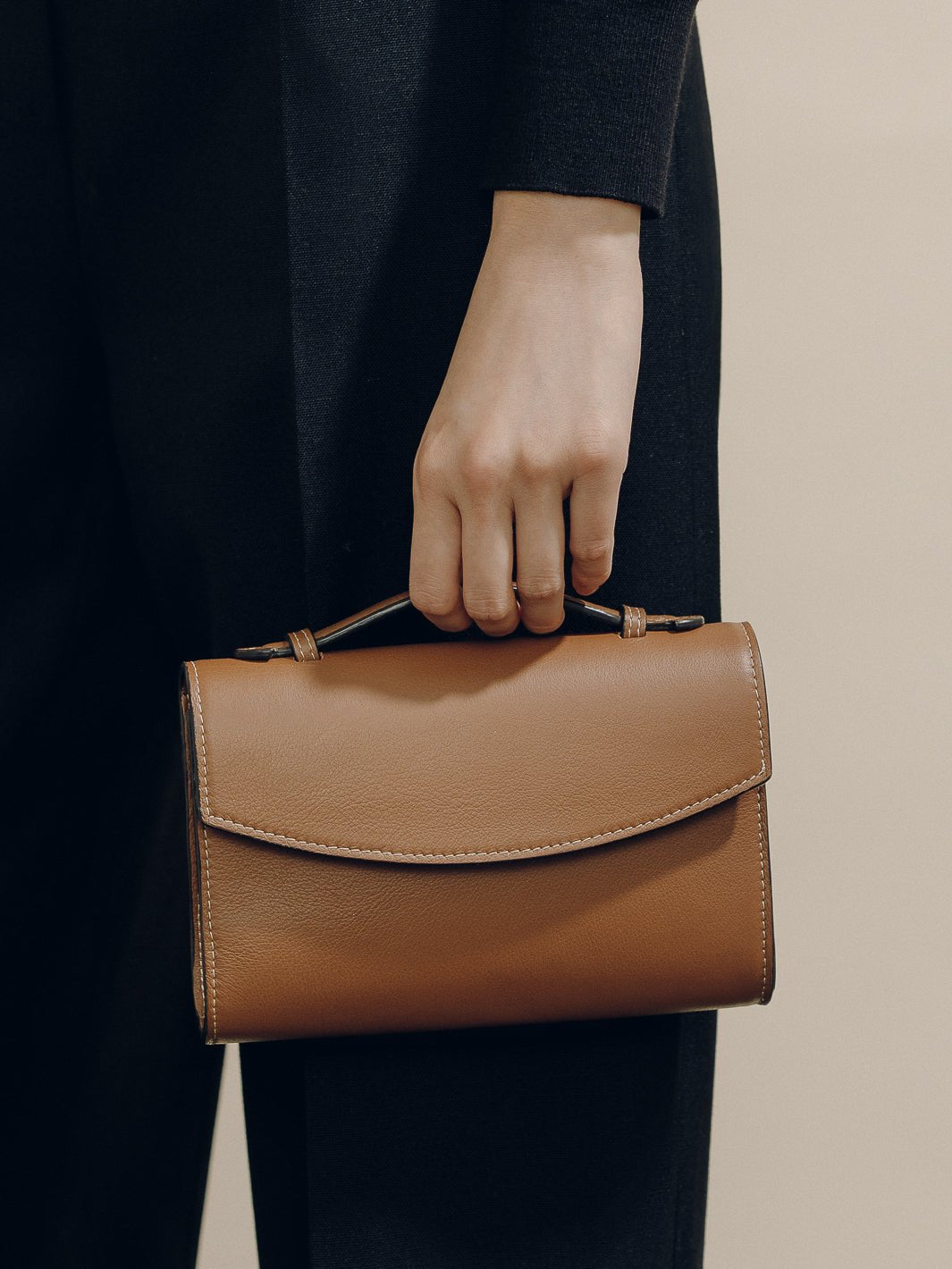 The Top Handle Clutch in Cognac Nappa
