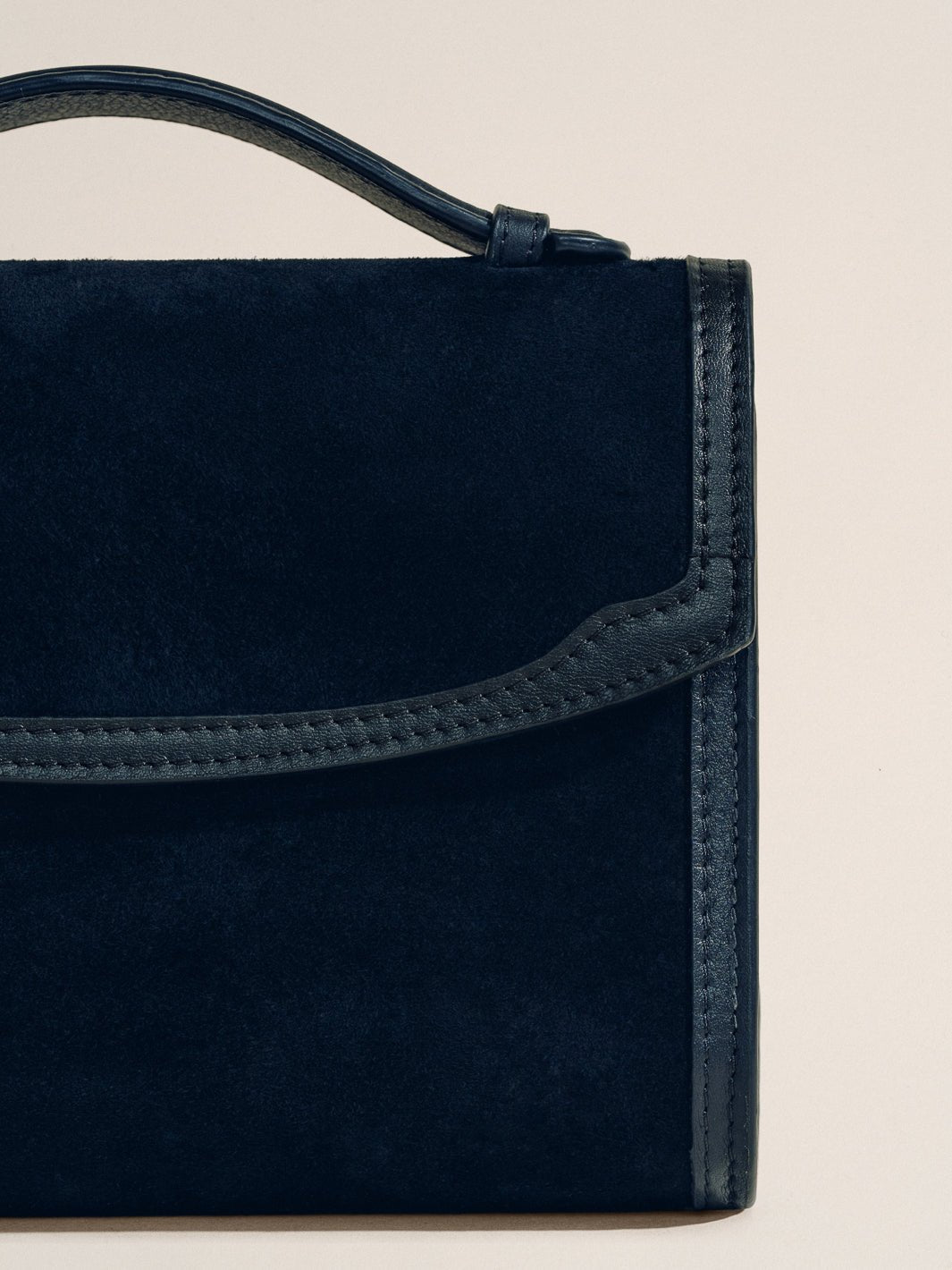 The Top Handle Clutch in Black with Western Trim