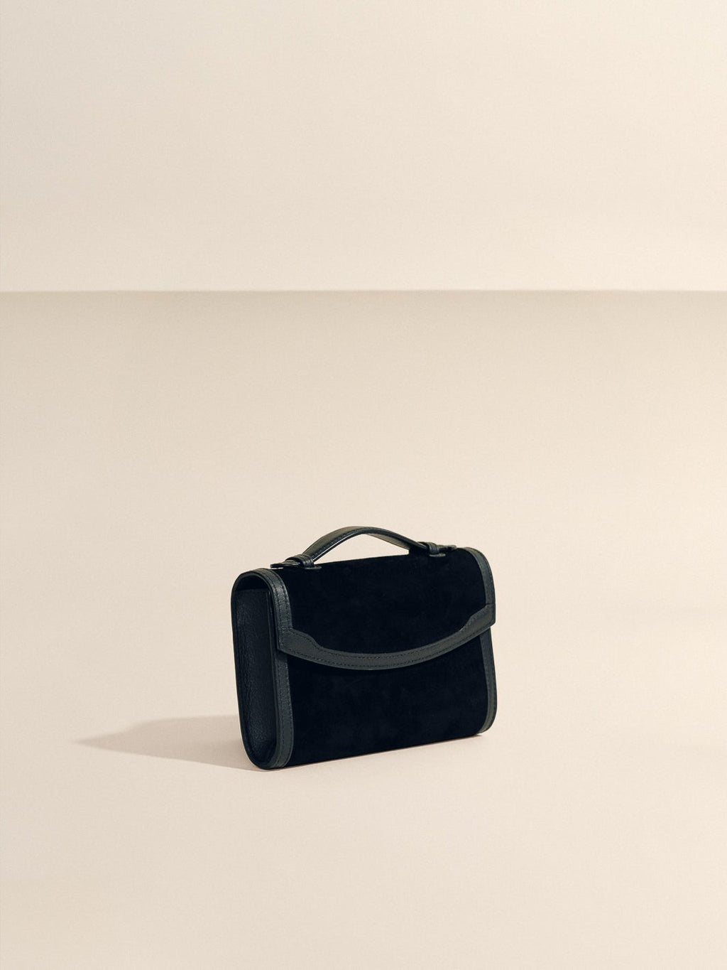The Top Handle Clutch in Black with Western Trim