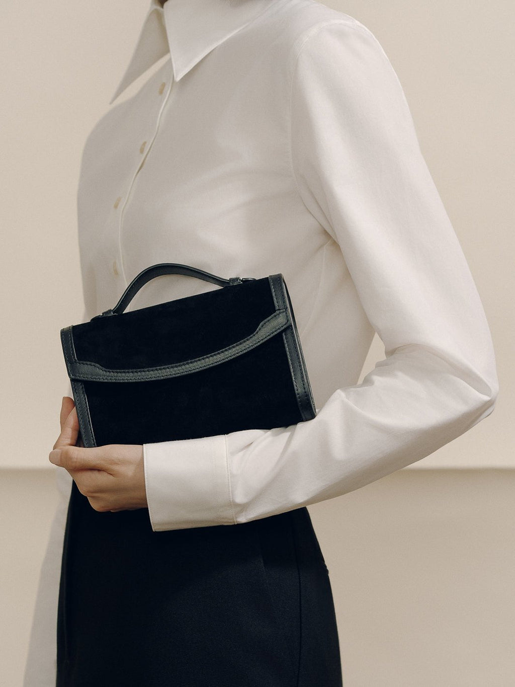 The Top Handle Clutch in Black with Western Trim