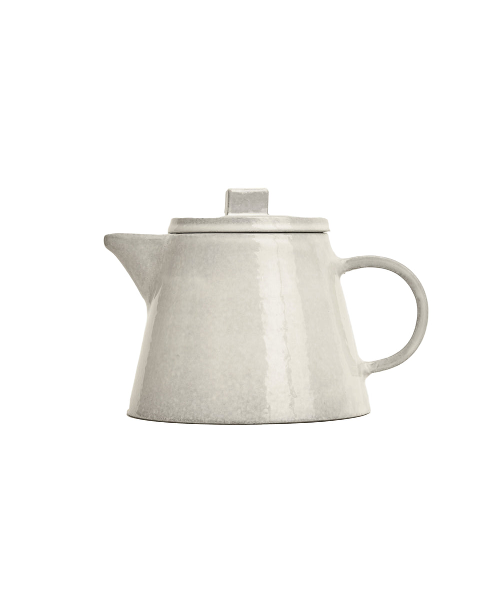 Side view of Assisi Tea Pot showcasing handcrafted glazed Umbrian clay finish and minimalist silhouette on white background