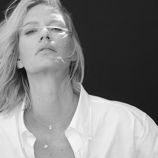 Pear Shaped “Floating” Diamond Pendant