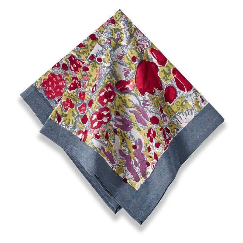 Angled view of Jardin Napkins red and grey set of 6 showcasing a colorful floral pattern and grey border on white background