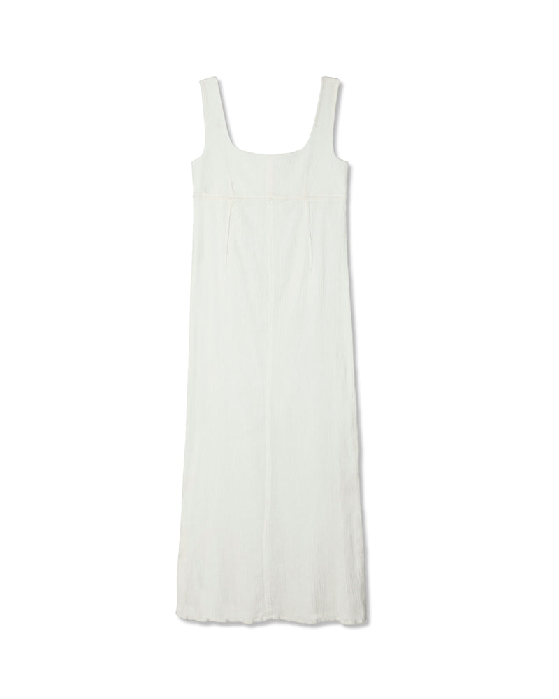Front view of the white The Wethersfield Dress showcasing its relaxed silhouette and empire waist against a white background