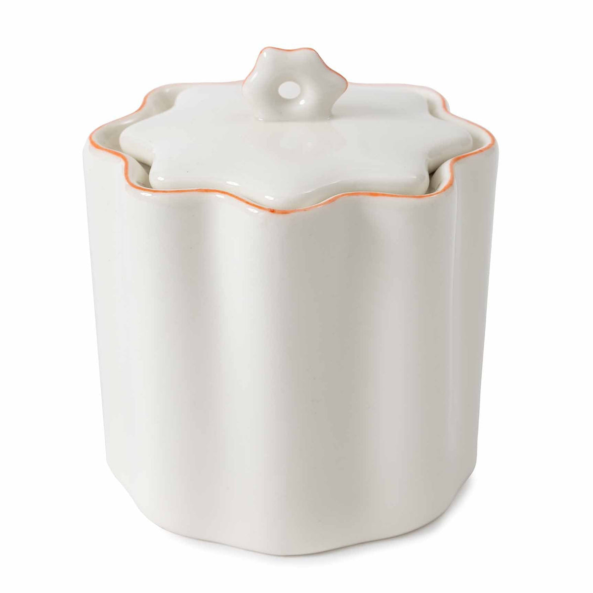 Front view of Le Marais cotton jar in orange showing scalloped ruffled lid and orange-trimmed cream porcelain on white background