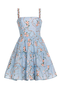 Front view of Lima Mini Navegante Mini Dress showcasing floral print, embroidered straps, and tiered ruffle skirt